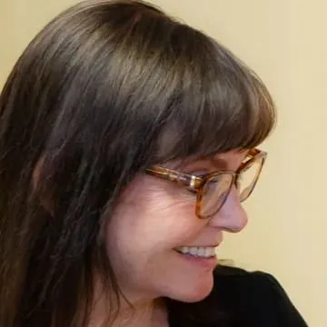 Dr. Bradley in her eyeglasses